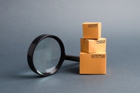 cardboard-boxes-and-a-magnifying-glass-2022-11-09-06-35-28-utc