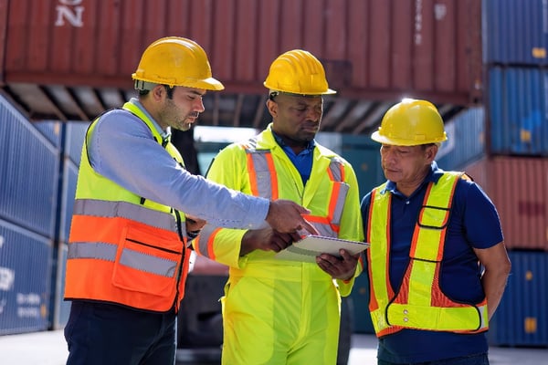engineer-working-in-container-storage-yard-stand-f-2022-11-17-10-57-16-utc-1